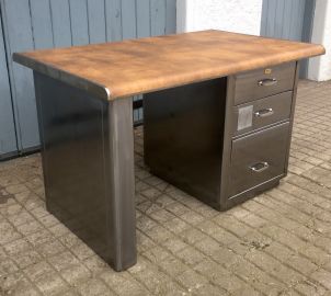 Small polished single pedestal desk