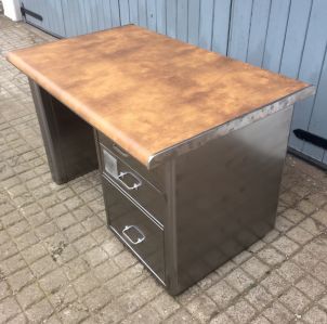 Small polished single pedestal desk